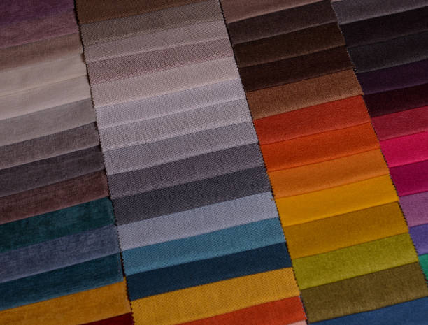 istock Samples of furniture fabrics.Multicolor fabric texture background. 1366197012