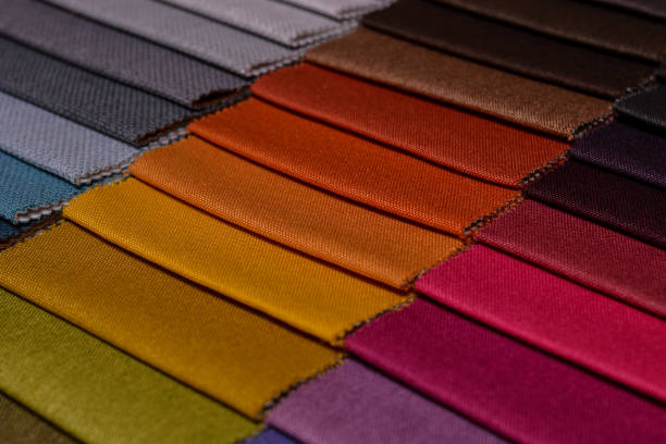 istock Samples of furniture fabrics.Multicolor fabric texture background. 1366197017