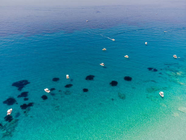 istock Sea coast with rocks and clear water at Corfu, Greece 1366197018