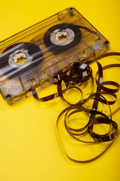 vintage audio cassette and untwisted tape. - reel to reel tape imagens e fotografias de stock