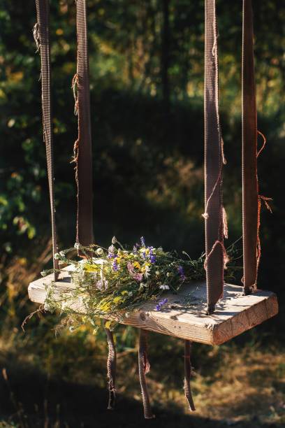 istock A bouquet of flowers on a swing 1366208641
