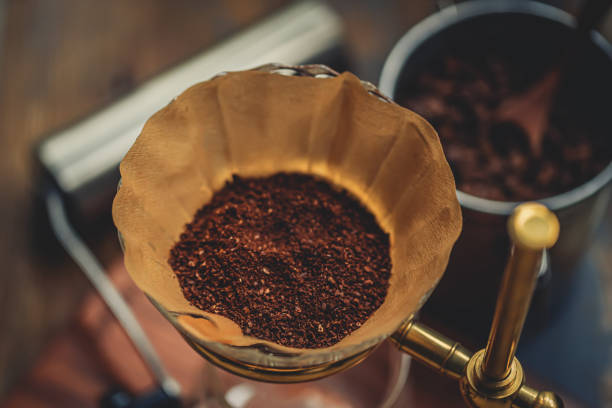 istock Make Pour-over Coffee,Pour Coffee Powder Into Coffee Filter 1366217391