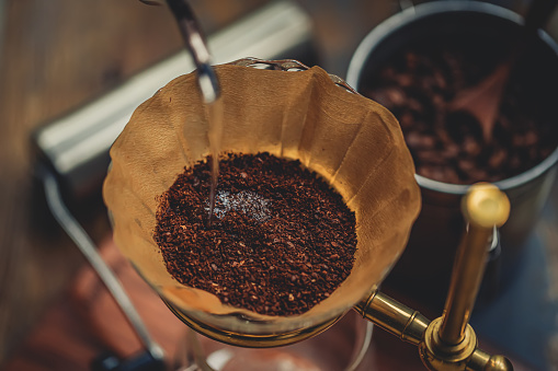 Wooden coffee mill and coffee beans