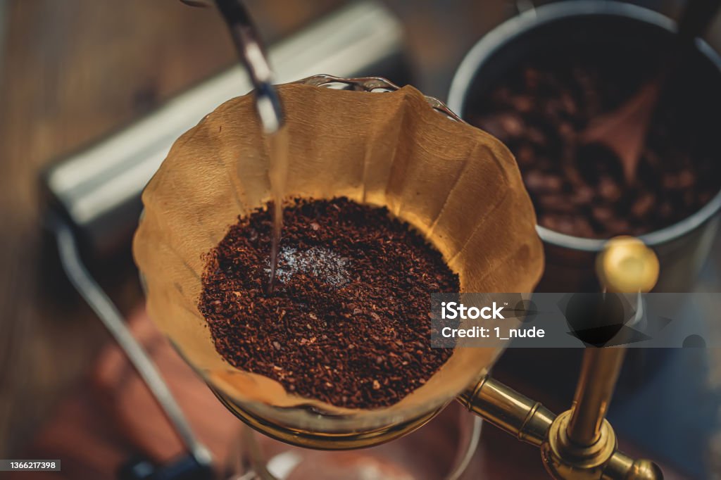 Make Pour-over Coffee,Pour Hot Water Into Coffee Powder Brewed Coffee Stock Photo