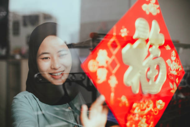 istock a chinese muslim decor her house for imlek celebration 1366222010