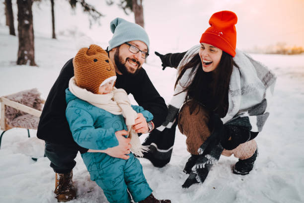 istock Family in a winter walk 1366225216