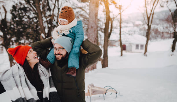 istock Family in a winter walk 1366225352