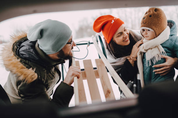 istock Family going to have some fun with sleds on snow 1366225538