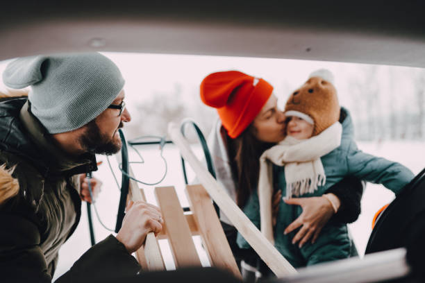 istock Family going to have some fun with sleds on snow 1366226108
