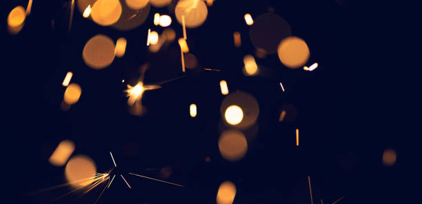 istock background of abstract glitter lights. gold, blue and black 1366226113