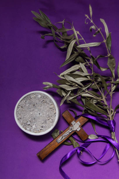 istock bowl with ashes and olive branch. ash wednesday concept 1366228257