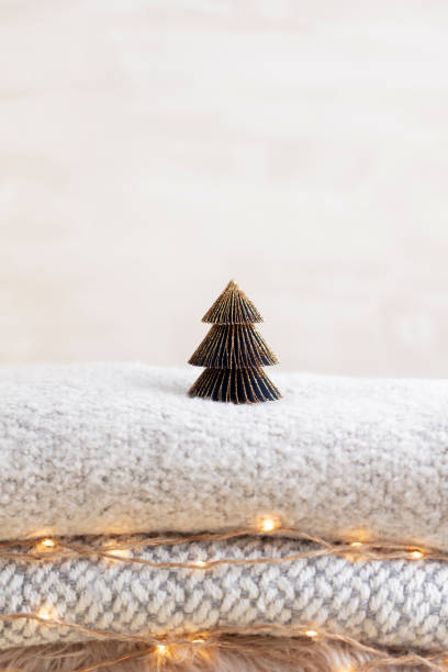 istock Christmas little trees and golden lights bokeh. 1366229003