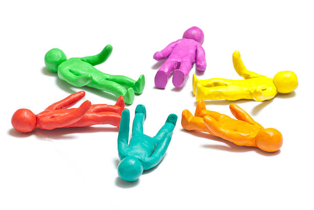 colorido plasticine guys - childs play clay small men team fotografías e imágenes de stock
