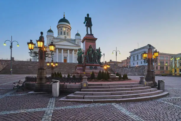 Photo of Monument to Emperor Alexander II and Cathedral of St. Nicholas in Helsinki.