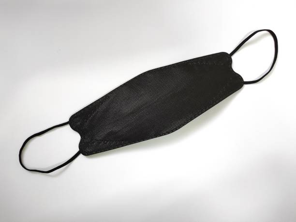 istock Black kf94 mask on white background 1366238942