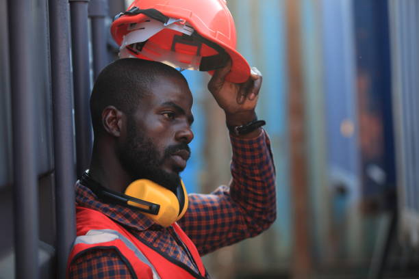 istock African American handsome black engineer he is working in container box yard area of  logistics transportation import export or shipping industry 1366240053