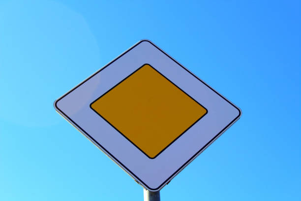Road sign Main road. Close-up.