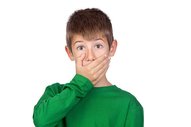 istock Beautiful boy covering his mouth 136624528