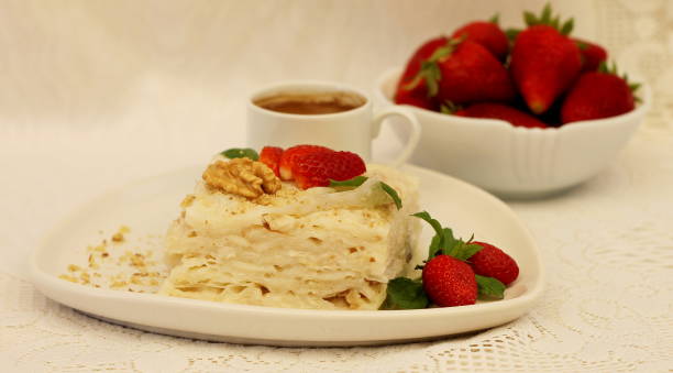 istock Gullach is a national Turkish dessert made from milk and rice cakes, which has been prepared since the time of the Ottoman Empire. 1366245585