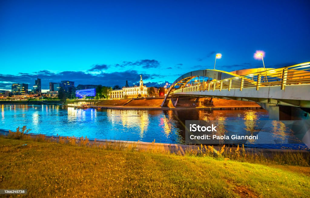 Illuminated bridge of Vilnius along Neris river, Lithuania. Illuminated bridge of Vilnius along Neris river, Lithuania Lithuania Stock Photo