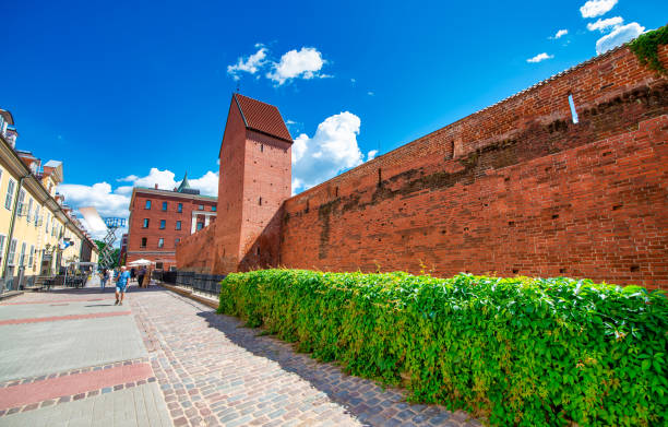 Malbork, Poland - August 10, 2011:Medieval Malbork castle on the river Nogat, Poland. The largest castle in the world by surface area, and the largest brick building in Europe. Historical capitol of the Teutonic Order - Crusaders