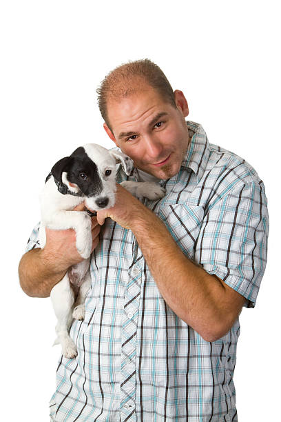 istock Young man and his puppy 136624884