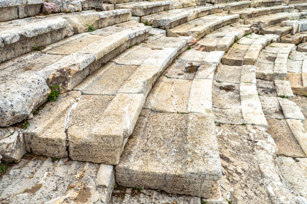 stone seats of theater of dionysus at acropolis foot, athens, greece - sophocles imagens e fotografias de stock