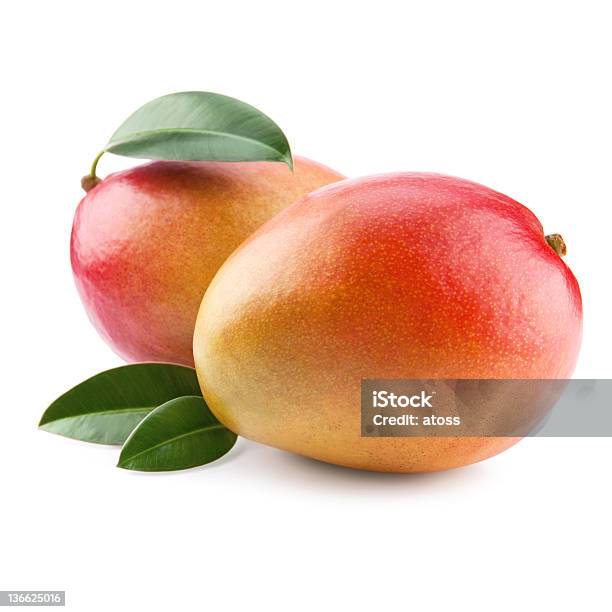 Mango Foto de stock y más banco de imágenes de Dos objetos - Dos objetos, Mango - Fruta tropical, Alimento