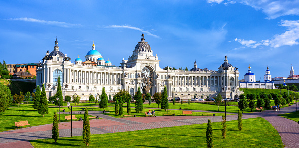 Panorama of Kazan in summer, Tatarstan, Russia. Scenic view of beautiful Farmers Palace (Ministry of Environment and Agriculture), garden and park near Kazan Kremlin. Urban landscaping of Kazan city