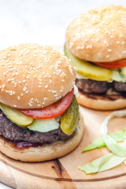 istock homemade hamburger with pickled cucumber and tomato 1366250491