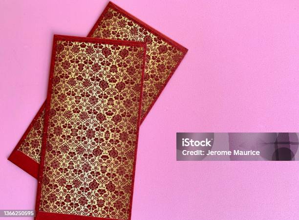 Dark Red And Golden Color Chinese New Year Envelopes With Pink Background Chinese New Year Concept Stock Photo - Download Image Now