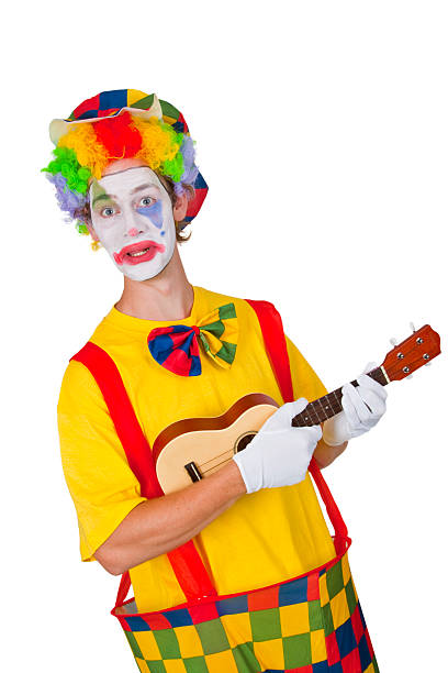 istock Colorful clown with ukulele 136625177