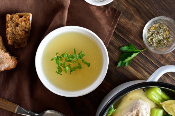 istock Chicken broth with vegetables and spices 1366255538