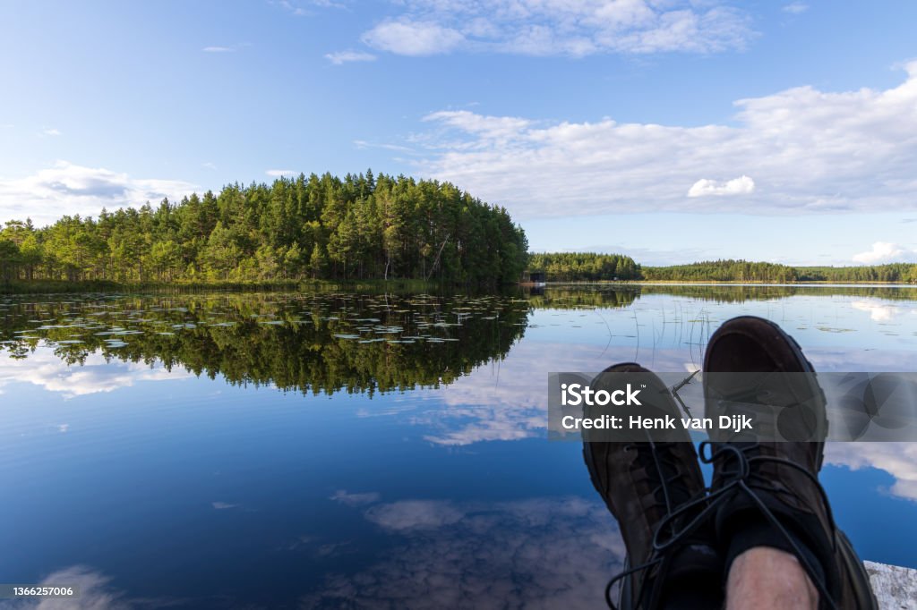 Relaxing at a beautiful Swedish Lake Mountain Stock Photo