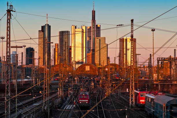 Frankfurt Central Station with the skyscrapers of the banking district in the background in the afternoon light of the sun