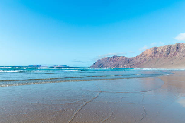 istock Beach view at Caleta de Famara, Lanzarote. 1366258252