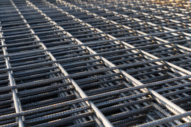 istock The rebar is bonded with steel wire for use as a construction infrastructure. Which part of the rebar has rusted due to chemical reactions. 1366258344