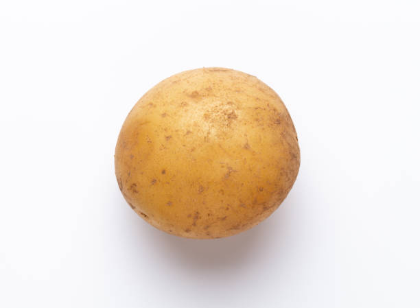 istock Potatoes isolated on white background. Flat lay. Top view. 1366258479