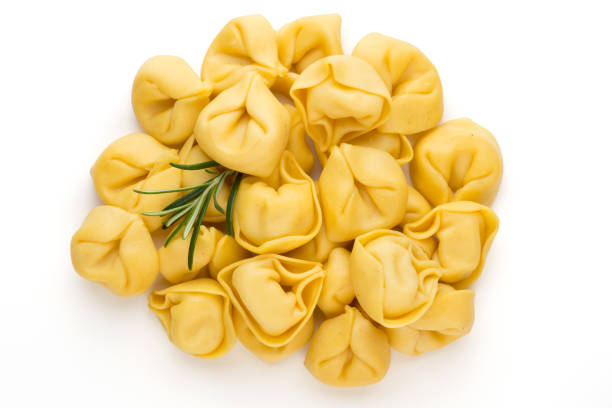 istock Raw homemade pasta,tortellini with herbs. 1366260107
