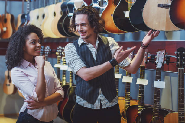 istock People in musical shop 1366261755