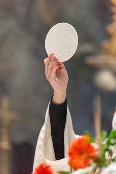 istock The Holy Bread in the rite of Eucharist 1366265816