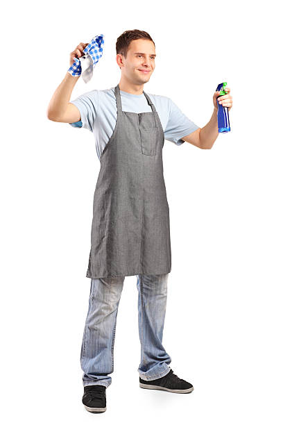 istock Young cleaner holding a cleaning supplies 136626681