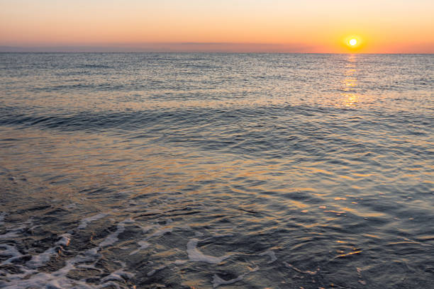 istock sunrise on the sea with reflection on the water 1366266872