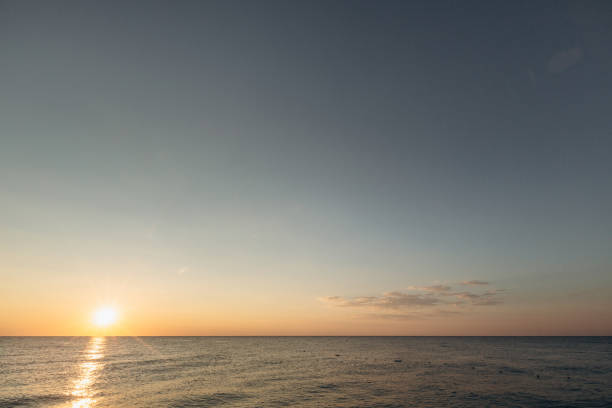istock sunrise on the sea with reflection on the water 1366267038