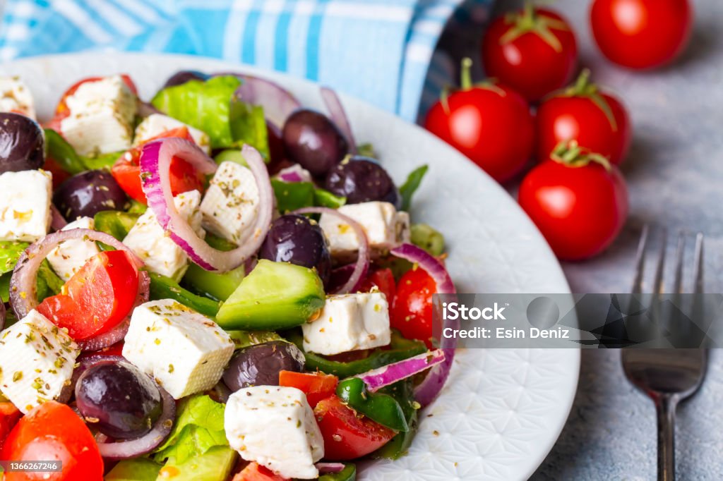 Greek salad with fresh vegetables, feta cheese and kalamata olives. Healthy food. Greek Salad Stock Photo