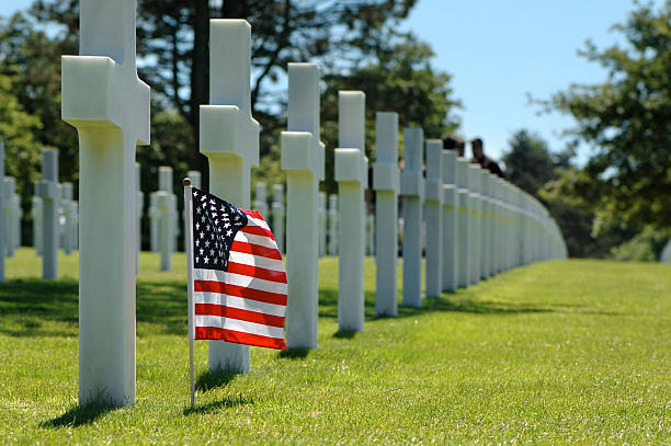 istock American flag on a military cemetery. 136627350