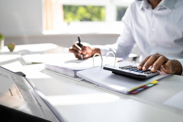 istock African Tax Accountant Ledger Public Record 1366273983