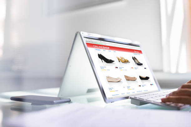 istock Young African American Woman Using Convertible Laptop 1366274050