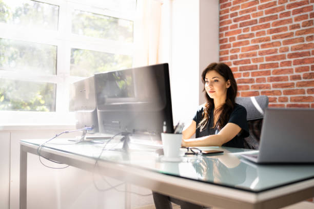 istock Businesswoman Using Business Computer In Office 1366274166