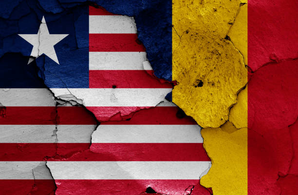 istock flags of Liberia and Chad painted on cracked wall 1366274591